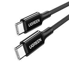 A close-up of a white UGREEN USB-C to USB-C cable with a braided jacket and "5A" markings on the connector neck, coiled with a branded Velcro strap.